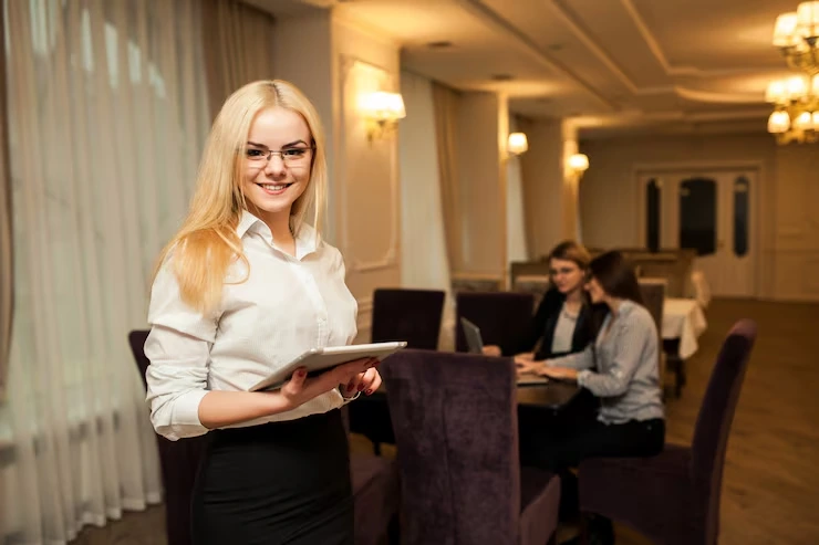 Waiting staff serving guests at a corporate event